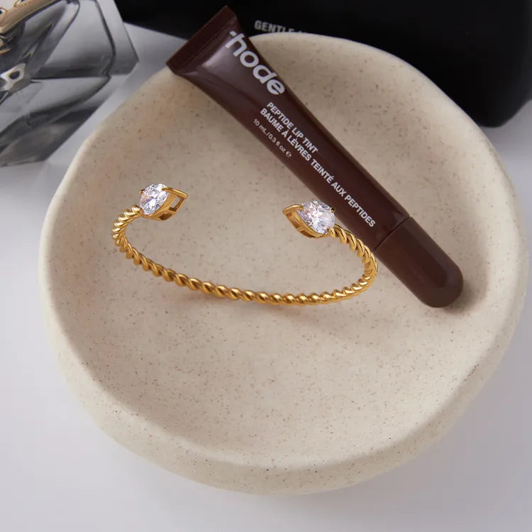 18K Gold Stainless Steel + Zircon White Water Drop Zircon Twisted Open Bracelet