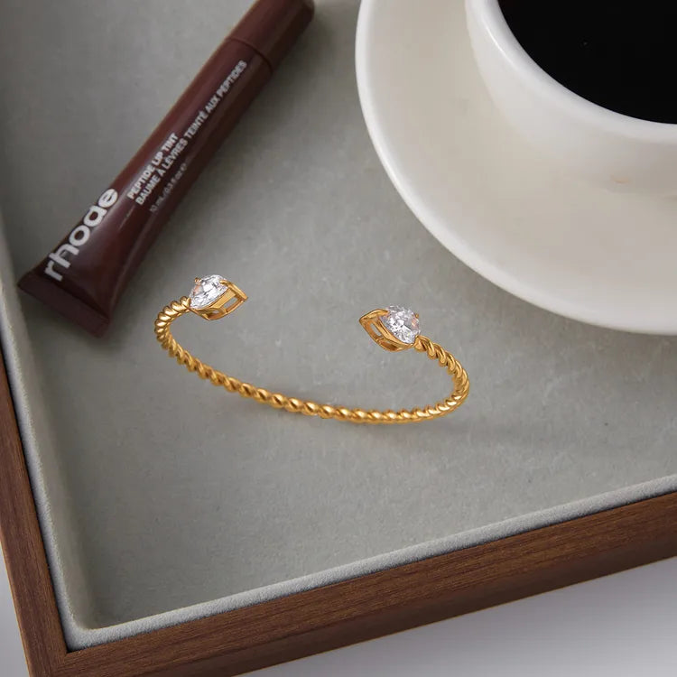 18K Gold Stainless Steel + Zircon White Water Drop Zircon Twisted Open Bracelet